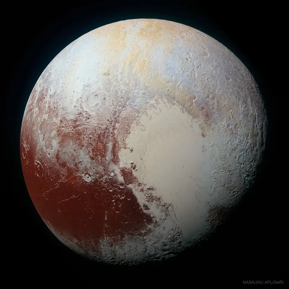Плутон в усиленных цветах: снимок зонда New Horizons с ледяным сердцем – областью Томбо